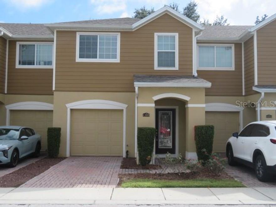 Gated community Townhouse. Dark kitchen cabinets with open area for kitchen table. Front driveway parking space and 1 car garage. Winter Springs location! Close to restaurants and amenities. Community has a pool and playground area.. Very clean and well taken care of. All bedrooms are upstairs, one half bathroom is downstairs. Master has a large bathroom with separate tub and stand up shower.