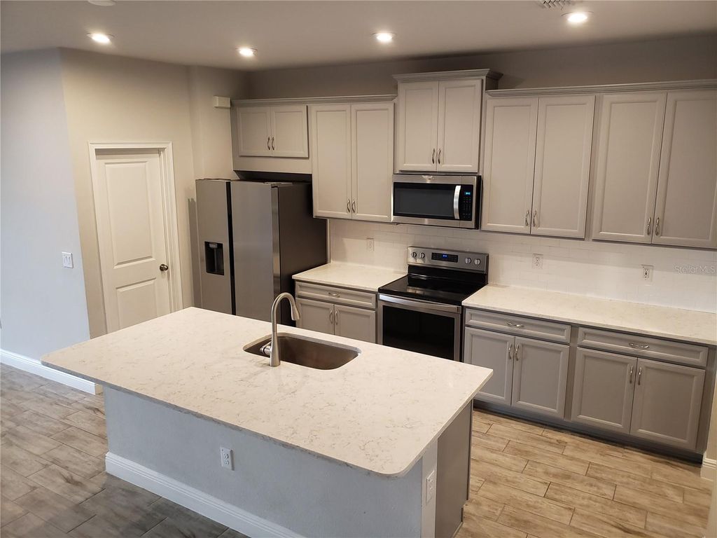 Photo of 17623 Ledger Line Lane, Lutz, FL 33558 (MLS # TB8459706)