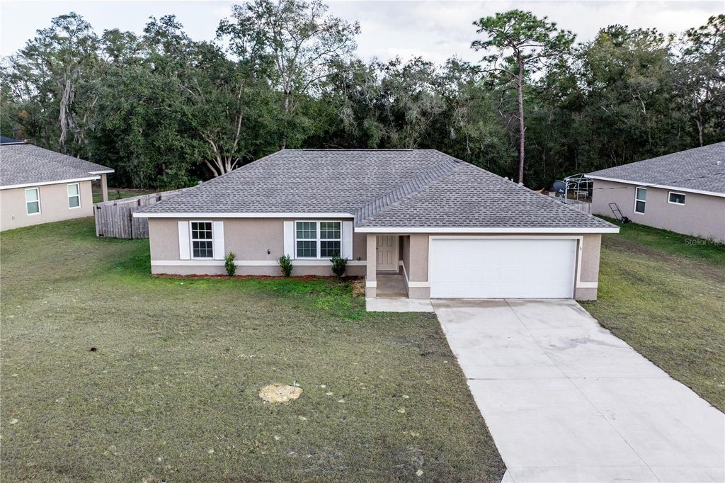Photo of 5 Malauka Radial Circle, Ocklawaha, FL 32179 (MLS # G5106611)