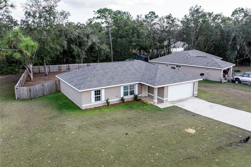 Photo of 5 Malauka Radial Circle, Ocklawaha, FL 32179 (MLS # G5106611)