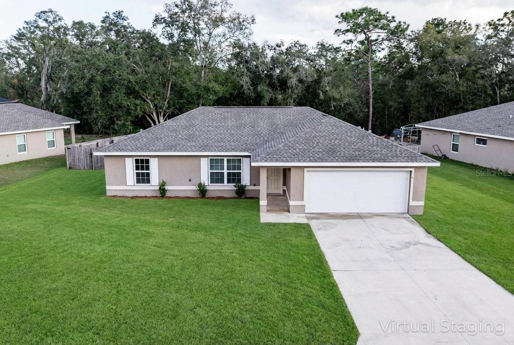 Photo of 5 Malauka Radial Circle, Ocklawaha, FL 32179 (MLS # G5106611)
