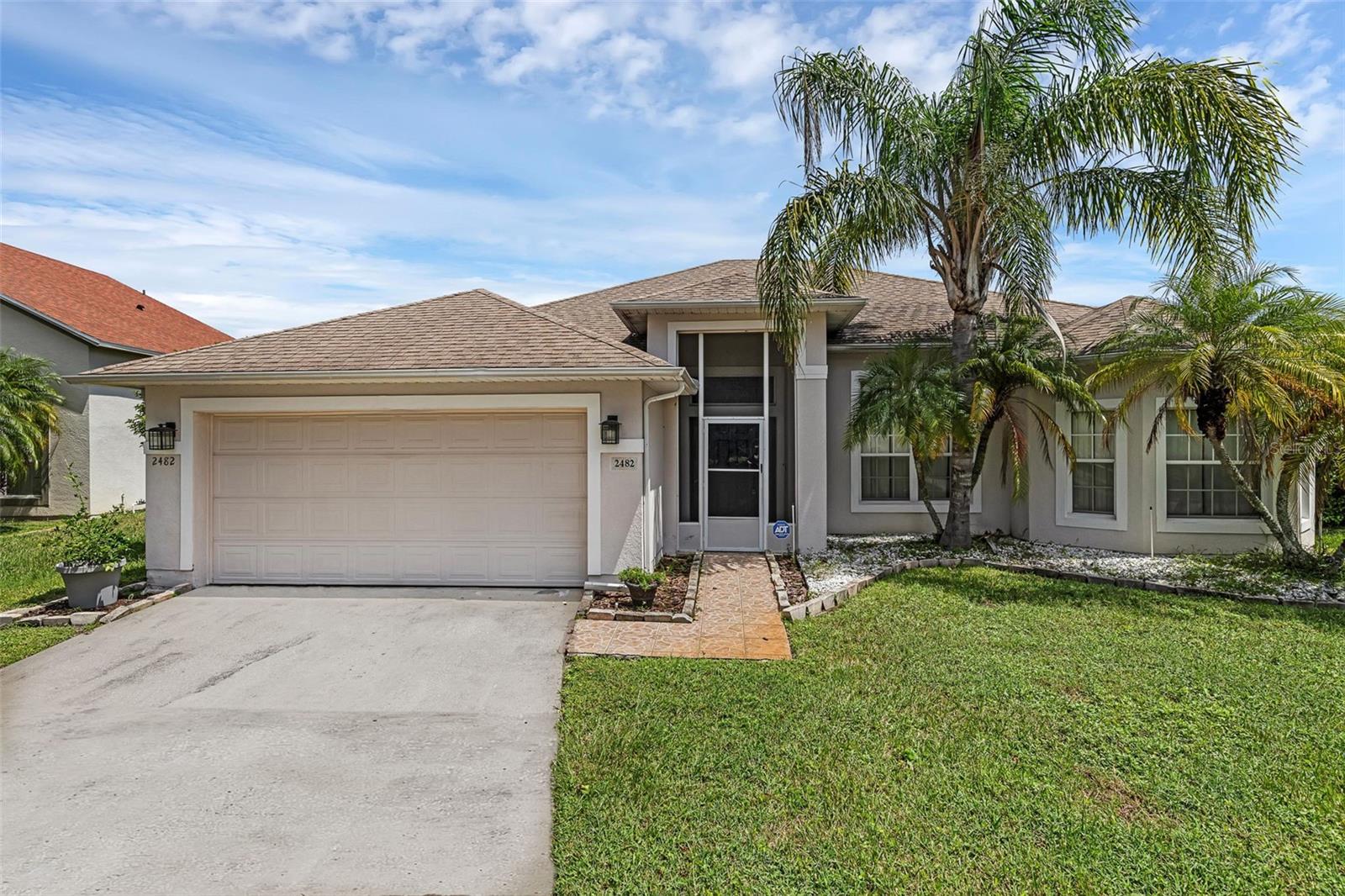 Welcome to this stunning 3-bedroom, 2-bath single-family home in the highly sought-after gated community of Brighton Lakes in Kissimmee. Offering 1,930 sq. ft. of beautifully remodeled living space, this home has been thoughtfully upgraded from top to bottom, featuring brand-new finishes throughout. Step inside to find gray luxury vinyl plank flooring, a state-of-the-art kitchen with modern cabinetry and appliances, and luxuriously upgraded bathrooms complete with elegant gold fixtures. The open floor plan flows seamlessly to a spacious living area, perfect for entertaining. Additional highlights include a washer and dryer, a 2-car garage, and a huge patio overlooking the expansive yard, ideal for outdoor living. Perfectly situated directly across from the community’s resort-style amenities, residents can enjoy a clubhouse, gym, swimming pool, basketball and tennis courts, playgrounds, lake views, bike trails, and more. This home combines modern luxury and unbeatable convenience within a vibrant, amenity-rich neighborhood, making it the perfect place to call home! Don't miss out on this home and schedule your private showing TODAY!