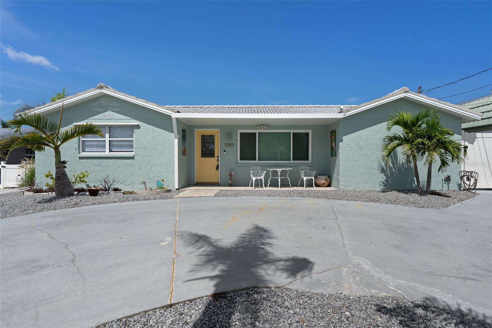 Marine Dream Cottage - Coastal Luxury Less Than 800 Feet from the Gulf!
Welcome to your waterfront escape in Hudson! This fully renovated 3-bedroom, 2-bathroom coastal gem offers the ideal blend of comfort, style, and location—just steps from the Gulf of Mexico. Whether you're looking for a full-time residence, a vacation getaway, or an income-producing investment, this home checks every box.
Inside, the open-concept living room (18x12) is filled with natural light and features plank-style tile flooring and double-pane windows throughout. The stunning 16x12 kitchen has been completely updated with granite countertops, stainless steel appliances, sleek fixtures, and crisp cabinetry. A cozy breakfast area opens to the enclosed 24x10 rear patio via sliding doors with built-in blinds—perfect for year-round relaxation.
A split-bedroom layout provides privacy for guests and owners alike. The spacious 19x11 primary suite boasts its own access to the rear patio, generous closet space, and a beautifully remodeled en-suite bath with a tiled walk-in shower and updated vanity. Two additional guest bedrooms (14x12 and 11x11) share an upgraded bath with a tub/shower combo.
Outside is a true tropical paradise. The fenced backyard features mature landscaping, a low-maintenance pebble/stone yard, and a circular paver driveway with walkways surrounding the home. Relax in the heated, kidney-shaped pool with Diamond Brite finish and waterfall feature, or unwind on the 30x24 open paver patio overlooking the canal.
Waterfront amenities include a large wooden dock, private boat lift, and wood deck—launch straight from your backyard and live the salt life with ease. Additional perks include 2023 AC, 2016 roof, seawall, and pool, a 6x8 storage shed, outdoor shower, and vinyl privacy fencing with dual gates.
Don’t miss this rare opportunity for resort-style living on Florida’s Gulf Coast. Schedule your private tour today!
