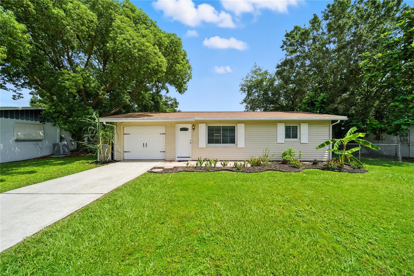 Perfectly situated in East Bay Estates, this cozy 2-bedroom, 1-bathroom block home with a 1-car garage is move-in ready and full of charm. The open floor plan offers a spacious family room, central kitchen, and dedicated dining area — ideal for everyday living and entertaining. Enjoy the recently updated bathroom, new flooring throughout, and freshly painted interior for a clean, modern feel. Step outside to a great screened-in lanai and a fully fenced large backyard — perfect for pets, gatherings, or simply relaxing outdoors. There's also ample side access for a boat, trailer, or more. Located just minutes from parks, scenic trails, award-winning beaches, and vibrant downtown St. Pete and Largo, offering endless dining, shopping, and cultural experiences. Best of all, this home is in a non-evacuation zone with no flood insurance required — a rare find in this area!
Ideally situated close to beaches, shopping, and major roads, this centrally located home makes getting anywhere in the Tampa Bay Area quick and easy!