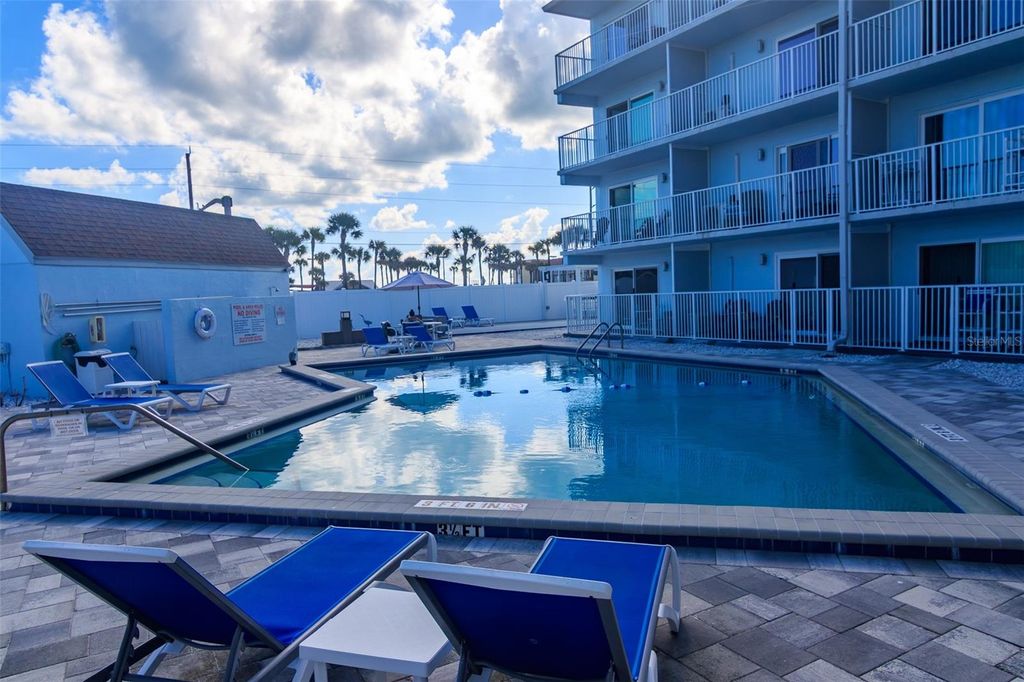 Photo of 3700 S Atlantic Avenue #303, New Smyrna Beach, FL 32169 (MLS # O6399841)