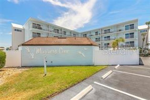 Photo of 3700 S Atlantic Avenue #303, New Smyrna Beach, FL 32169 (MLS # O6399841)