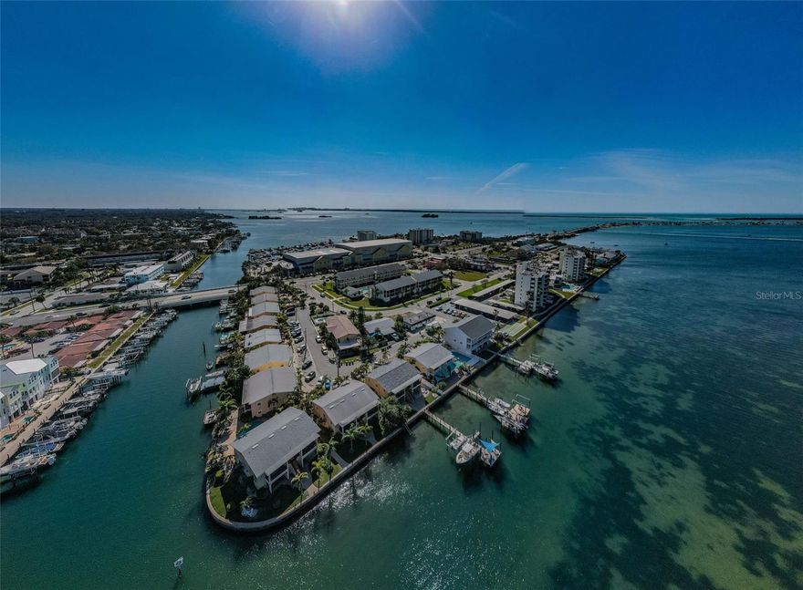 Million-Dollar Views at an Affordable Price!
Welcome to your fully furnished slice of paradise in beautiful Dunedin, offering unobstructed, panoramic water views of St. Joseph’s Sound and the Gulf of Mexico. This beautifully updated 2-bedroom, 1-bath first-floor waterfront condo delivers breathtaking views, sparkling open water, and frequent dolphin and manatee sightings — all from the comfort of your own home. The open-concept layout seamlessly connects the kitchen, dining, and living areas, creating a light-filled space designed to maximize the spectacular views. Sliding glass doors lead to your private patio, while the spacious primary bedroom also enjoys direct patio access and expansive Gulf views, imagine waking up to paradise every day. The spacious kitchen features granite countertops, solid wood cabinetry, stainless steel appliances, stylish backsplash, updated lighting, crown molding, and tile flooring throughout. Additional upgrades include a new roof and washer/dryer hookup for added convenience.
This Mediterranean-style waterfront community offers resort-style amenities including a heated pool with updated equipment, tropical landscaping, tiki huts, outdoor grilling areas, and a seawall and fishing dock perfect for relaxing or casting a line. Enjoy peaceful waterfront living with the flexibility for income-producing rental opportunities.  Located just minutes from Honeymoon Island, Caladesi Island, the Pinellas Trail, marinas, golf courses, and the charming shops and restaurants of Downtown Dunedin. Walk to Frenchy’s and Marker 1 Marina, and enjoy a short drive to Clearwater Beach and Tampa International Airport.  Whether you're looking for a full-time residence, vacation getaway, or investment property, this is your opportunity to own a true waterfront gem in one of Florida’s most sought-after coastal communities.
Schedule your private showing today and start living the waterfront lifestyle.