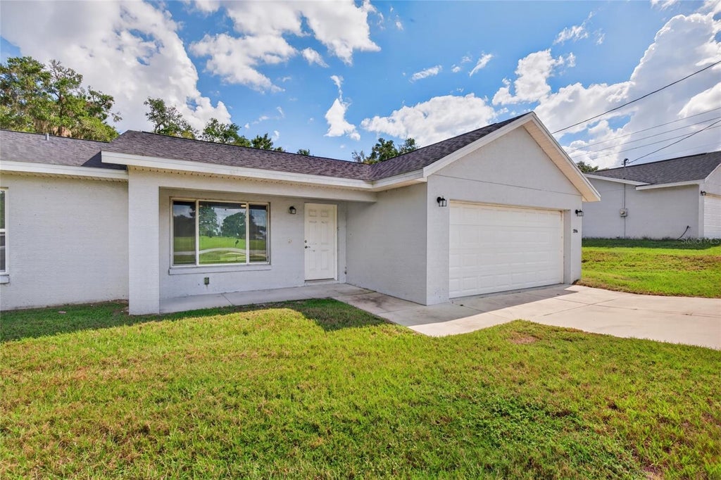 Photo of 296 Oak Lane Track, Ocala, FL 34472 (MLS # OM733135)