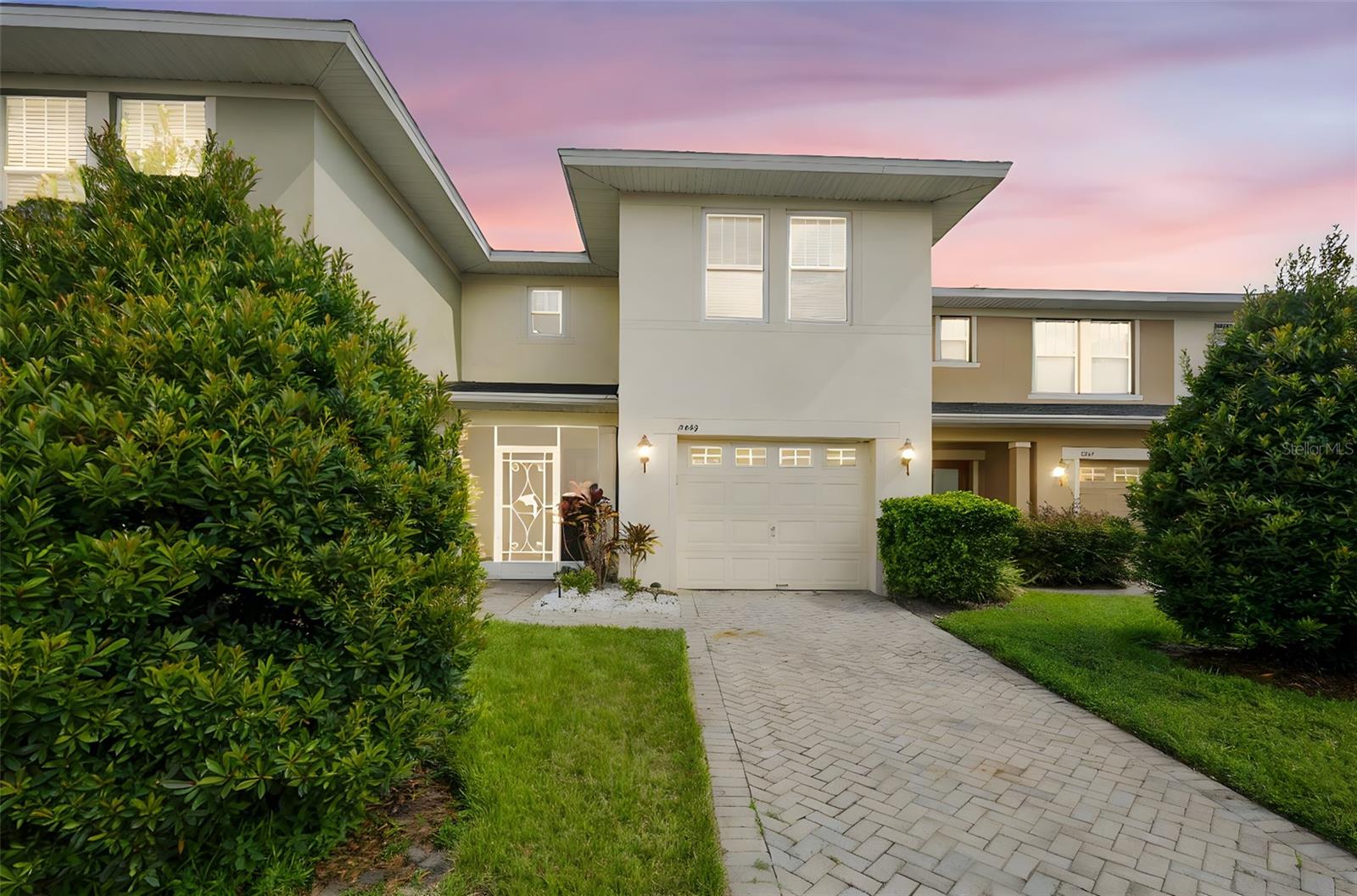 Live easy in Tivoli Village! This move-in-ready 3-bed, 2.5-bath townhouse in a gated community blends comfort, convenience, and calm. Enjoy an open layout, versatile loft space, and screened porches—with the back porch overlooking a tranquil pond and fountain where the gentle sound of water sets the mood. Major updates like a new roof, AC, windows, and more are already done. The remodeled owner’s suite and upstairs laundry (washer/dryer included) add even more ease. Just minutes from UCF, Lake Nona, shopping, and dining. Want to experience it? Come see for yourself—schedule your tour today!