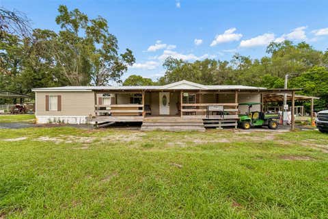 Photo of 18020 Rigsby Road, Spring Hill, FL 34610 (MLS # TB8539971)