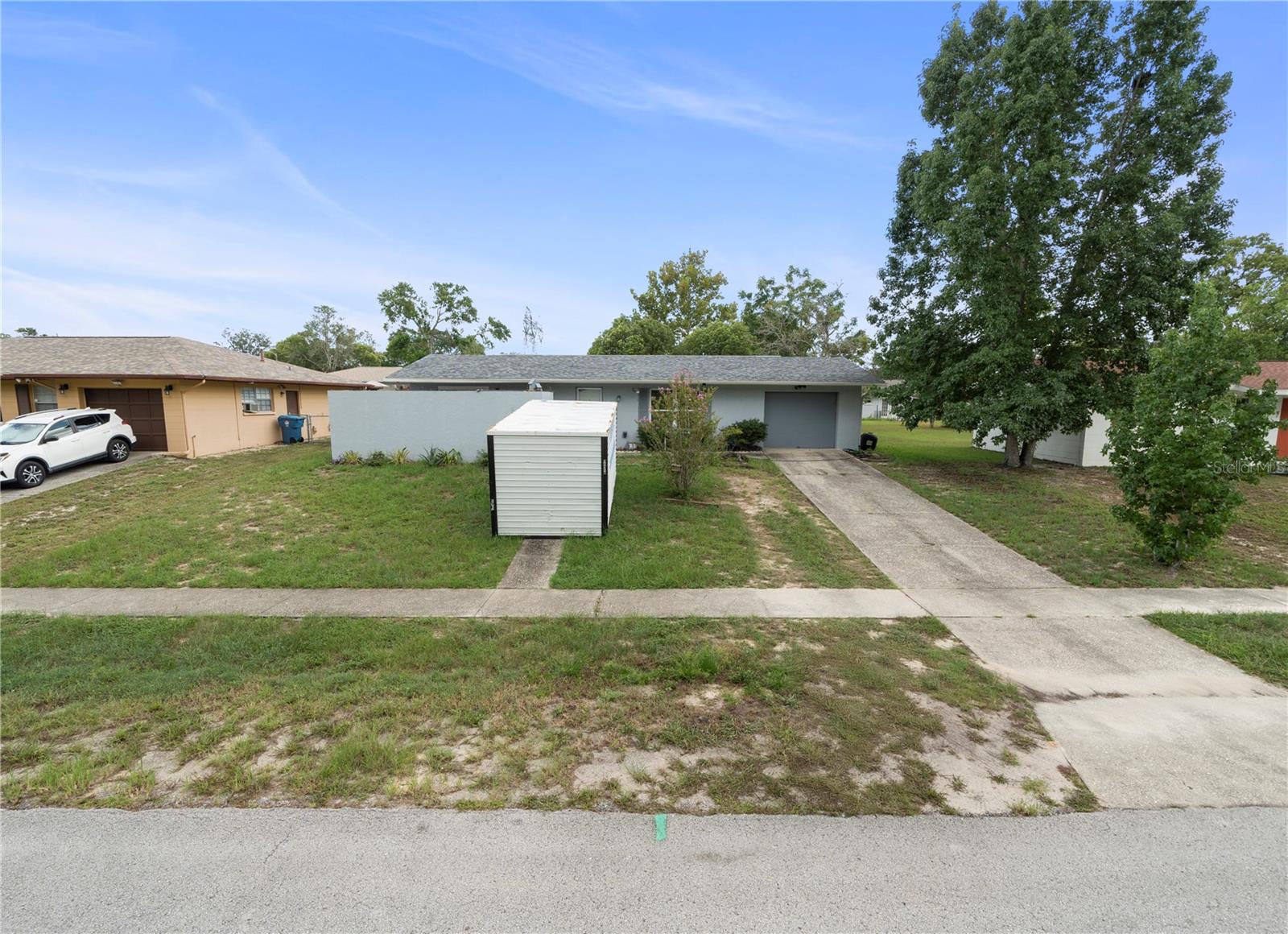 Welcome to a charming single-family home nestled in the heart of Spring Hill, FL. This property offers a rare opportunity to own a home in a peaceful, established neighborhood while still being close to everyday conveniences. With a spacious lot and functional layout, it really is the perfect investment opportunity. Step outside to enjoy the large backyard, which offers endless possibilities for outdoor activities, gardening, or future expansions. The property's size provides privacy while maintaining a welcoming, neighborhood-friendly feel. It's a great canvas for personalization and long-term enjoyment.
Located just minutes from local shopping, dining, and schools, this home combines convenience with tranquility. Commuting is easy with major roads nearby, and residents enjoy access to all the amenities that make Spring Hill a desirable place to live.
Come See Today!