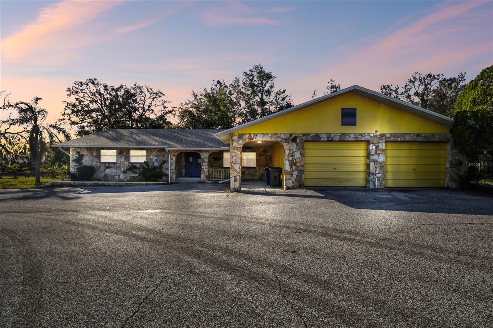 Seize this incredible opportunity to own a 2,600+ sq. ft. commercial property on high-visibility Little Road, a bustling six-lane thoroughfare with ample road frontage and convenient access to SR 52, HWY 19, the Suncoast Parkway, and public transit.
Situated on over an acre, this well-maintained property is currently operating as a chiropractic office but offers exceptional flexibility for a variety of professional, medical, or business uses. Key features include:
Two curb cuts & a circular driveway for seamless ingress and egress,
Over a dozen paved parking spaces for clients and staff,
ADA-compliant entrance ramp and bathroom for accessibility, Spacious reception area & administrative office space, Integrated garage storage space for added functionality, Functional, lit monument sign for high visibility, Kitchen/break area for staff convenience, canterlever roofing with no interior weight bearing walls so can be completely customized and a Load-bearing structural setup for easy interior modifications.
Additional amenities include two full baths, two half baths, a rear screened porch, and a paved rear patio area—offering plenty of space for expansion or outdoor workspace. Plus, enjoy peace of mind with a NEW ROOF installed in 2020!
This highly visible, easily accessible, and adaptable property is ideal for a growing business looking for prime location and space to thrive. Don’t miss out—schedule your private tour today!