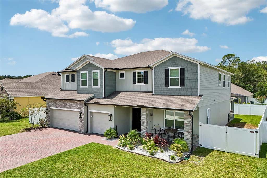 Photo of 2236 Elegant Manor Circle, Edgewater, FL 32141 (MLS # O6428868)