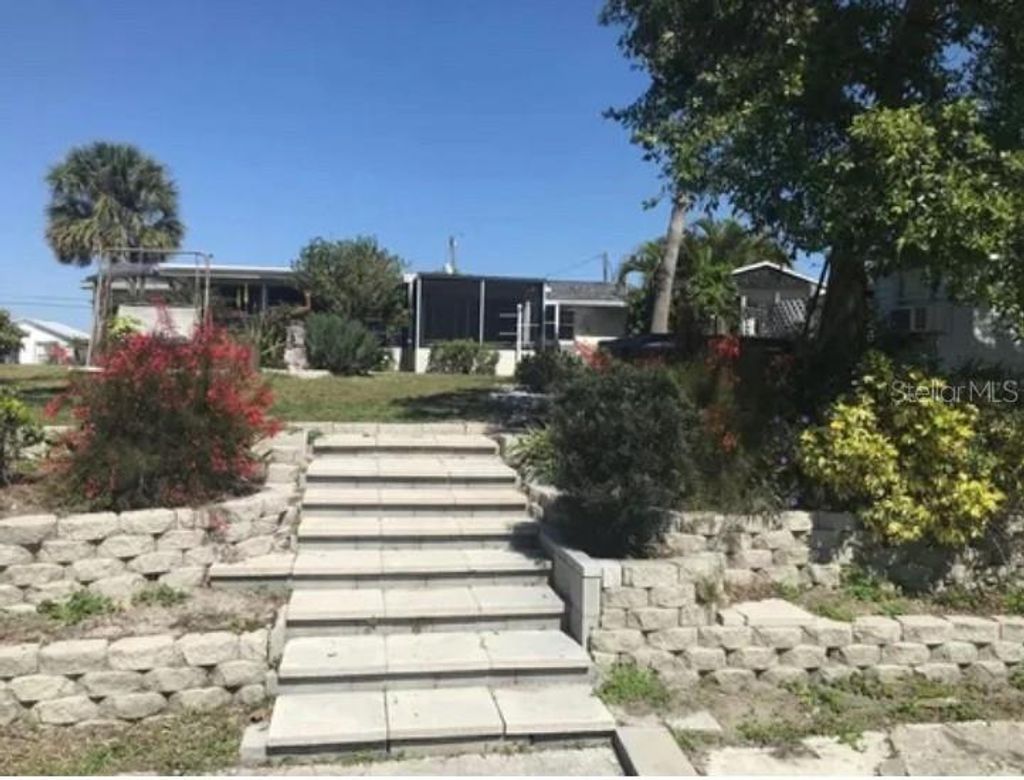 Photo of 117 Arlington Court NE, Port Charlotte, FL 33952 (MLS # A4671465)