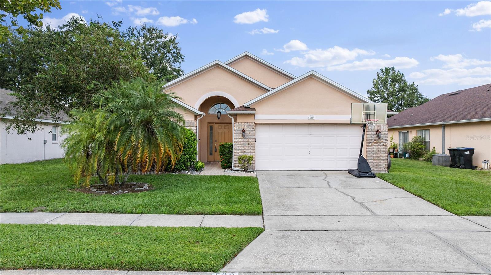 Welcome to this beautifully updated 3-bedroom, 2-bathroom pool home available for rent in one of South Orlando's most desirable and centrally located communities. Just minutes from Lake Nona, Medical City, Orlando International Airport, and major highways like 417 and the Turnpike. Inside, you’ll find a bright open floor plan with vaulted ceilings, neutral tile flooring throughout, and fresh modern finishes. The kitchen features modern cabinetry, quartz countertops, stainless steel appliances, and direct views of the screen-enclosed pool, perfect for entertaining or relaxing. The primary bedroom offers a walk-in closet and private en-suite bathroom, while the guest bath has been stylishly remodeled with granite and marble finishes. Additional features include an indoor laundry room, two-car garage, and plenty of natural light throughout. Enjoy your own private oasis with a fully fenced backyard and pool maintenance and landscaping included in rent.