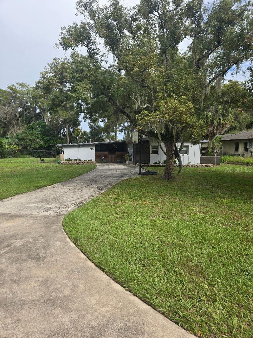 Photo of 9825 Lake Georgia Drive, Orlando, FL 32817 (MLS # O6347968)