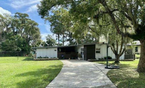 Photo of 9825 Lake Georgia Drive, Orlando, FL 32817 (MLS # O6347968)
