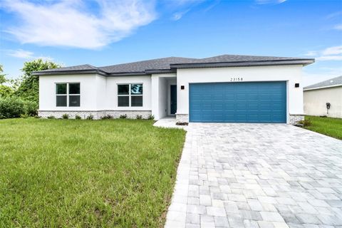Photo of 23158 Ranger Avenue, Port Charlotte, FL 33954 (MLS # A4676189)