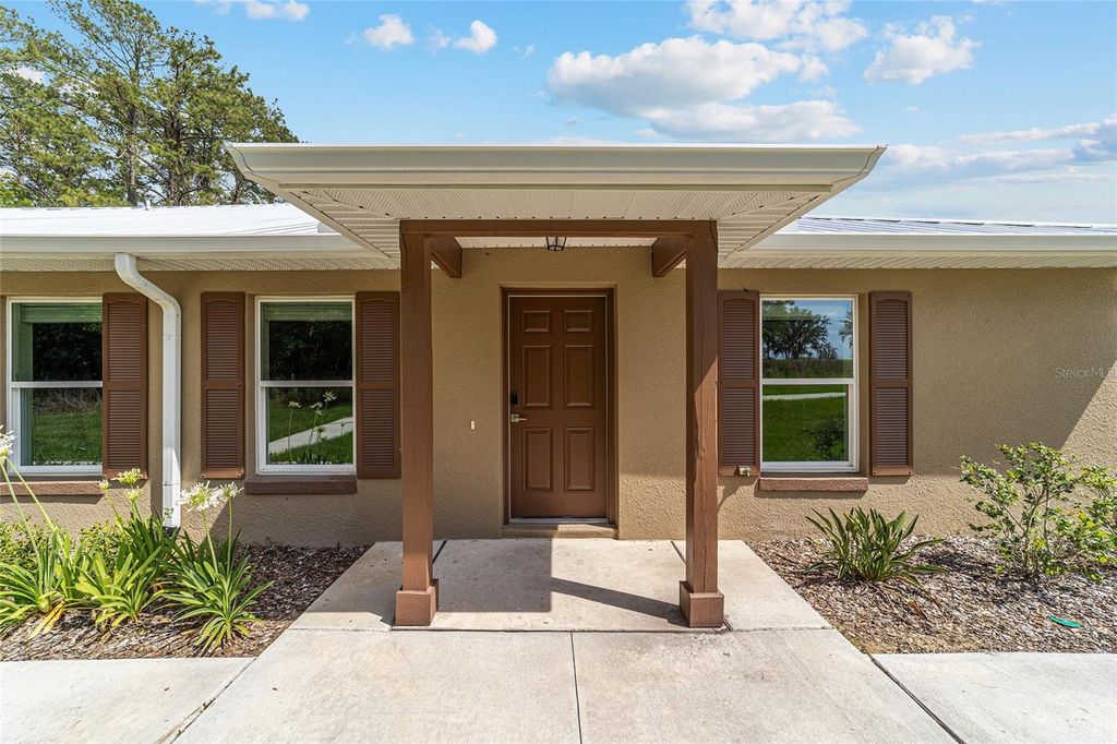 Photo of 4400 NW 74th Terrace, Ocala, FL 34482 (MLS # O6381338)
