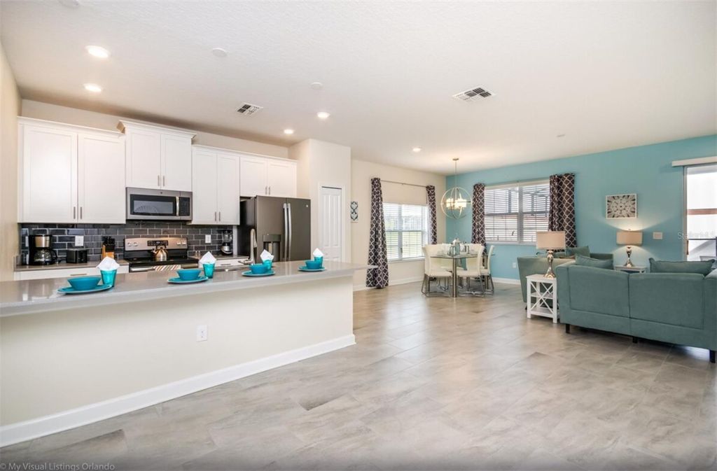 Photo of 9007 Stinger Drive, Davenport, FL 33896 (MLS # O6388447)