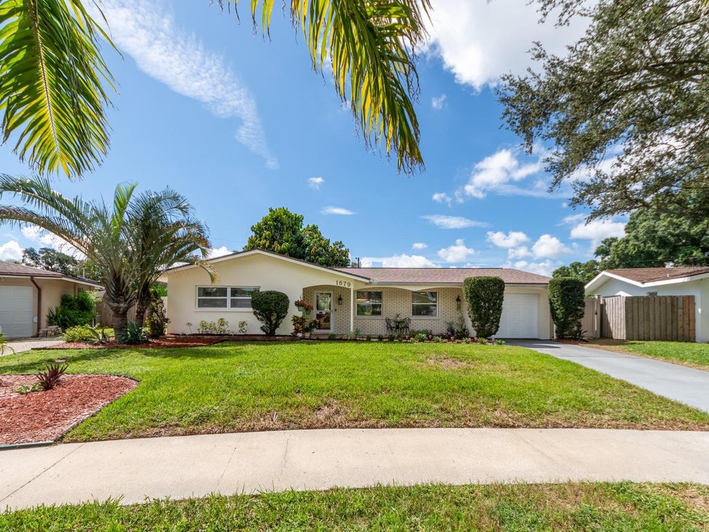 Photo of 1679 Woodridge Drive, Clearwater, FL 33756 (MLS # TB8545284)
