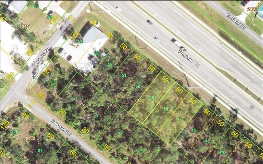 Discover the perfect location for your next business venture with this exceptional property on Tamiami Trail. This property is strategically located near established enterprises like the Port Charlotte Kia dealership, ensuring a steady flow of potential customers. This offering includes two parcels spanning a total of 22,500 square feet. With 150 feet of prime frontage on one of the area's most bustling commercial corridors, this property promises high visibility and accessibility. The Commercial General zoning opens up endless possibilities for development, whether you're envisioning retail, dining, office space, or a service-oriented business.