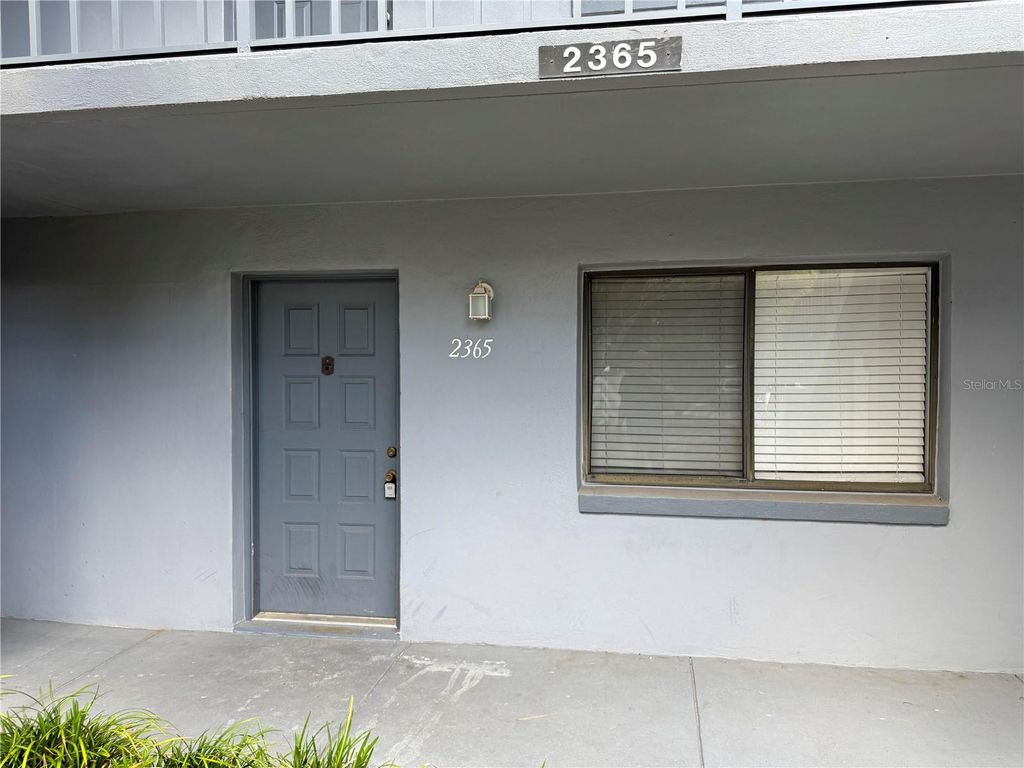 Photo of 2365 Oak Park Way #109, Orlando, FL 32822 (MLS # O6397702)