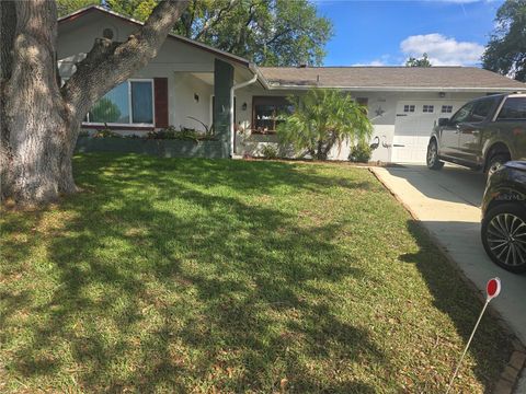 Photo of 10616 Springwood Drive, Port Richey, FL 34668 (MLS # TB8497180)