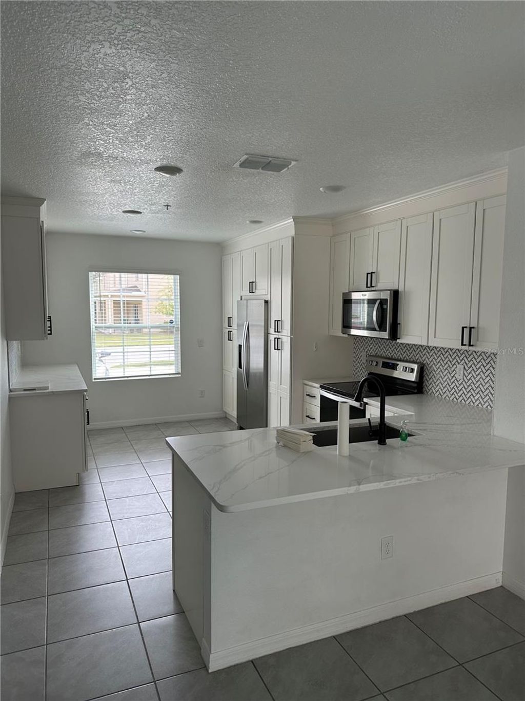 Photo of 12364 Bowes Branch Road, Orlando, FL 32824 (MLS # S5150907)