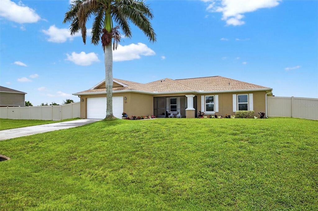 Photo of 125 Paddock Street, Lehigh Acres, FL 33974 (MLS # TB8401438)