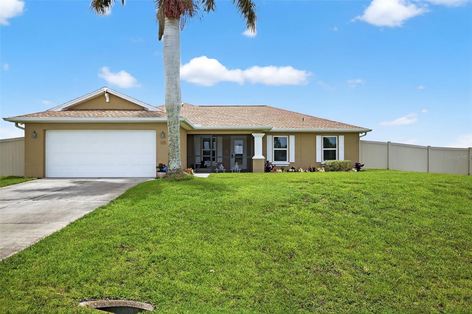 Turnkey, furnished and move-in ready, this beautifully maintained 3-bedroom, 2-bath pool home sits on a full 1-acre lot with tranquil canal and golf course views. Offering 1,666 sq ft of thoughtfully designed living space, this property is ideal as a primary residence, seasonal retreat, or high-performing rental. Inside, the bright, open floor plan features vaulted ceilings, a flexible den/office space, and a well-appointed kitchen with stainless steel appliances, ample cabinetry, and a breakfast bar. This home is being sold fully furnished, including a King Sleep Number bed and a Queen Tempur-Pedic bed with adjustable head and foot base, making it a true turnkey opportunity. Recent upgrades include: New roof (2023) HVAC system (2020) Water heater (2019) Storm Smart Cat 5 hurricane windows and Storm Smart Kevlar curtains (2023) New 6-foot vinyl privacy fence installed 18 inches above ground level—a thoughtful design that maximizes both airflow and visibility while still offering exceptional privacy throughout the yard. Fresh interior and exterior paint with updated carpeting throughout, Chamberlain garage door opener, Washer, dryer, and freezer included. Step into your private outdoor oasis featuring a 25’ x 19’ Chlorine pool with waterfall, a 9’ x 9’ spa, and a sprawling 54’ x 39’ paver deck, all set on a solid 4” concrete base. The triple-sized, fully fenced yard offers unmatched space for entertaining, gardening, pets, or additional future use—all with peaceful golf course and canal views. Concrete block construction, stucco exterior, shingle roof, and attached 2-car garage round out this truly move-in-ready home. Located near shopping, dining, schools, and major roadways, this home offers both peace and convenience. Opportunities like this don’t come often—schedule your private showing today!
