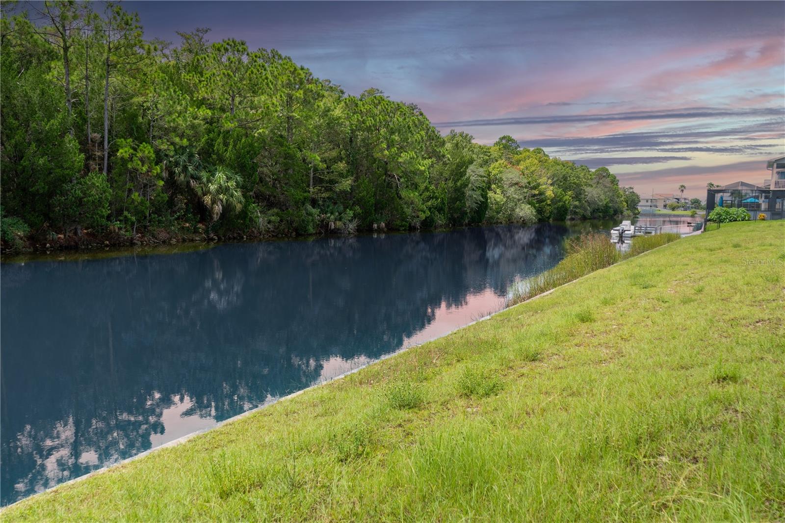 Imagine being tucked away in the serenity of Hernando Beach South; you hear the water in the canal behind you, and the birds are singing. You are enjoying the peace and quiet in your brand new, custom home.
This lot is ready to become a coastal lover's dream home. With 75 feet of water frontage backing up to an estuary, this lot is one of the last in Hernando Beach South that offers such quiet luxury. The lot comes with a concrete seawall, and is ready for permits to be pulled and building to begin! Polo Builders, INC. is a luxury, custom home builder who builds throughout Hernando Beach South. They are recommended for building on the lot, however, it is not required. Make this piece of paradise yours today!