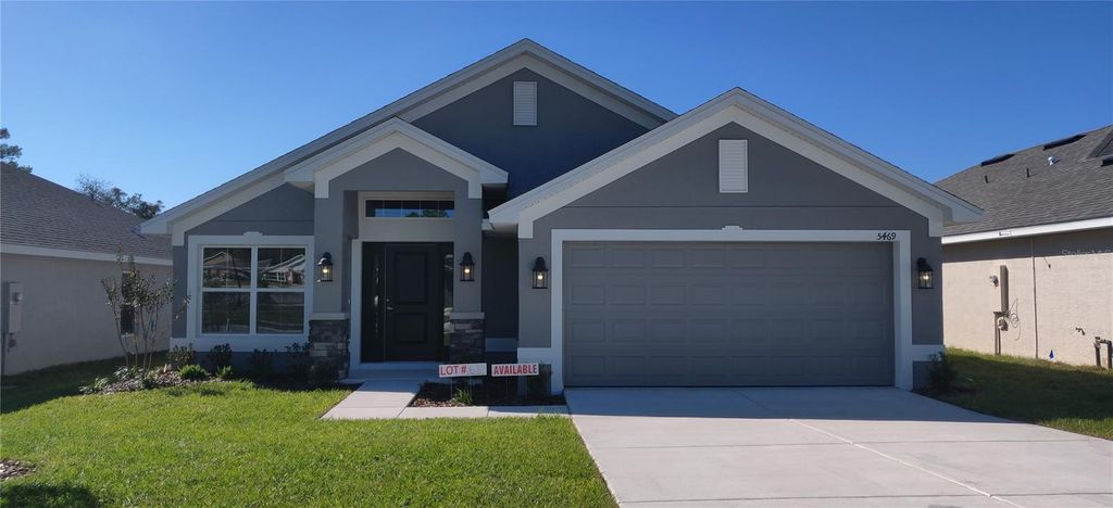 Photo of 5469 Ocean Breeze Drive, Spring Hill, FL 34609 (MLS # OM703612)