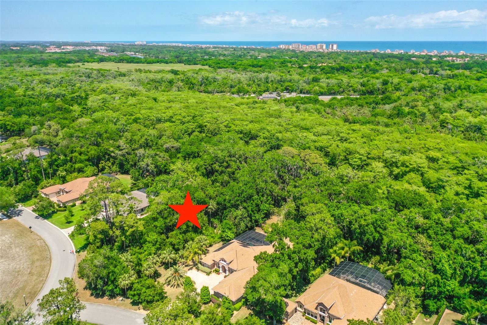 Ready to build your dream home? Check out this lot: GATED COMMUNITY, OVERSIZED (.72 ACRES), BACKS UP TO A PRESERVE, BEAUTIFUL TREES, QUIET STREET, FACES NORTH, COMMUNITY AMENITIES FOR THE PERFECT LIFESTYLE. It is rare to find a large estate size lot just minutes from the beach and shopping. Custom built homes with a variety of architecture give Wild Oaks a special ambiance. Once you drive through the gates, you will feel the relaxed atmosphere of Wild Oaks at Estates of Grand Haven. It is like living at a 5-star resort with all the amenities available to homeowners. Membership is available to Grand Haven Golf Club but is not required. Amenities included in the community are two clubhouses, pickle ball, croquet, Cafe, two heated pools, spas, two gyms, basketball, bocce, tennis courts and walking trails. Palm Coast is the best kept secret in Florida. Miles of beautiful beaches, over 125 miles of bike paths, beautiful parks along Intracoastal Waterway, a thriving art & theater community, home of famous artists, golf courses for every day, fishing, boating, wind sailing, surfing, canoeing are just a few of the things to do. Orlando and Disney World are close for a day outing and Jacksonville with all the shopping one could desire & the famous Mayo Clinic is one hour. NASCAR & ST. Augustine are within a thirty-minute drive.