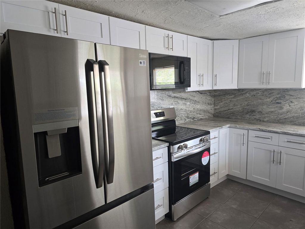 Photo of 7307 50th Avenue N, St Petersburg, FL 33709 (MLS # TB8383429)