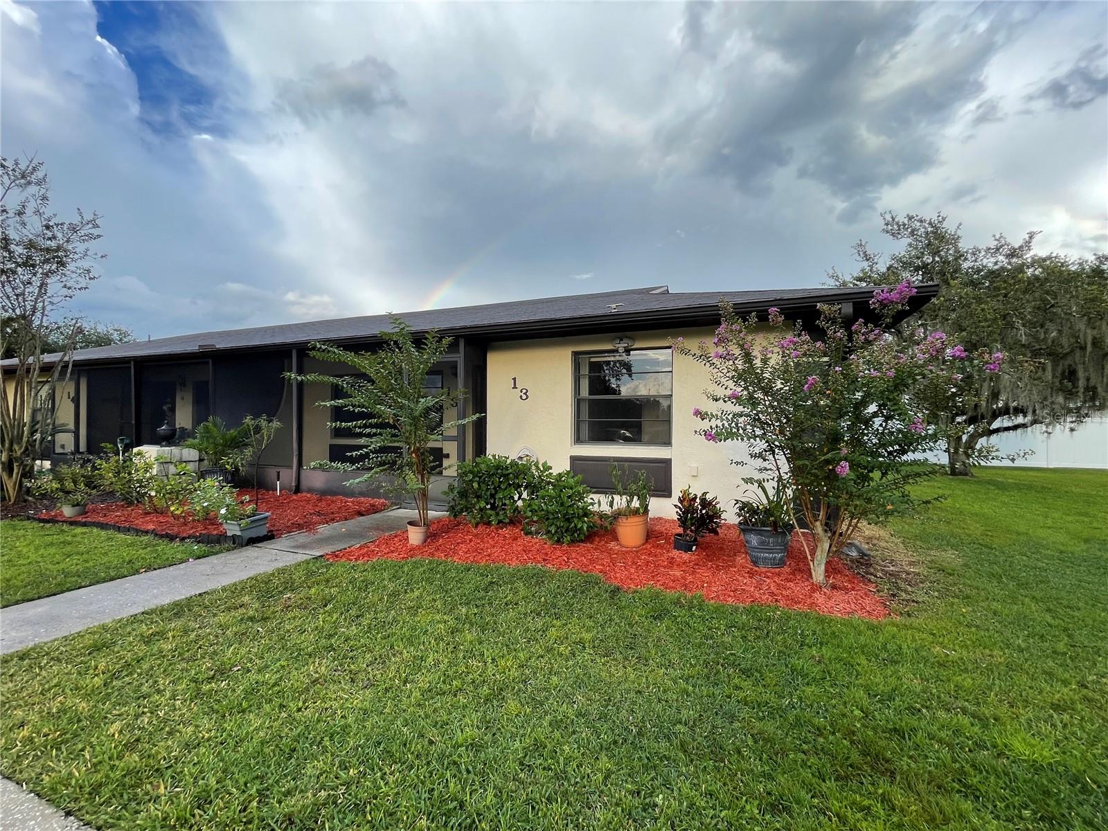 ** New Flooring Throughout and price drop***
Welcome to Brandy Chase Village! Here is your opportunity to live in this well desired 55+ community in Winter Haven with beautiful kept grounds and low HOA. If you are looking to downsize this cozy 2 bedroom /2 bathroom is perfect for you. This corner unit has all that you are looking for with community clubhouse and pool. Open living room area with dining room combo . Updated kitchen with pantry. Enjoy maintenance free living , priced to sell. Enjoy your back patio sunroom with laundry room and storage. Screened -in front porch and two assigned parking spaces one of which is covered and gives you front access to your unit with plenty of guest parking as well. Call today for your private showing. Minutes from the Polk Parkway for easy access to Tampa and Orlando and centrally located to nearby cities of Lakeland and Auburndale.