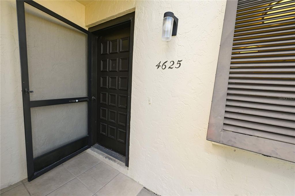 Photo of 4625 Longwater Chase #113, Sarasota, FL 34235 (MLS # A4669586)