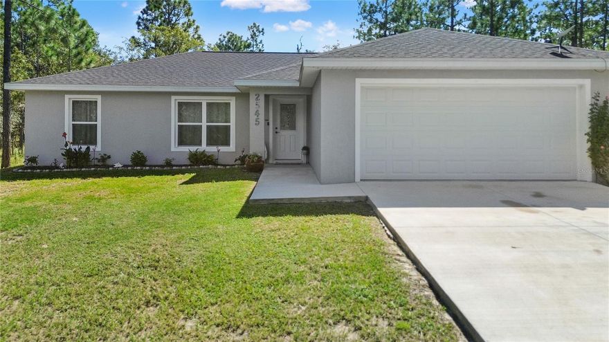 Welcome to your dream home in the heart of Rainbow Lakes Estates! This 2023 construction 3/2/2 offers the perfect blend of style, functionality, and tranquility on a spacious 0.24-acre lot surrounded by Florida’s natural beauty.

Step inside to discover an open-concept layout with luxury vinyl plank flooring throughout, creating a seamless flow from room to room. The chef’s kitchen features granite countertops, wood cabinetry with soft-close doors, and modern fixtures — ideal for entertaining.
The split-bedroom design ensures privacy, with the primary suite offering a tray ceiling, walk-in closet, and a spa-like bath with a tiled walk-in shower. Two additional bedrooms and a full bath provide ample space for guests, a home office, or hobbies.
Located just minutes from downtown Dunnellon and a short drive to Ocala, this home offers easy access to shopping, dining, and outdoor recreation — including the famous Rainbow River.
Additional Features include:
Inside laundry room for convenience
Energy-efficient construction
No HOA and no deed restrictions
Peaceful, wooded surroundings with nearby lakes and nature trails

Whether you're a first-time buyer, downsizing, or investing in a vacation retreat, this home checks every box. Don’t miss your chance to own a slice of Florida paradise!
Schedule your private showing today and experience the lifestyle that awaits at 2545 SW Soundview Drive.