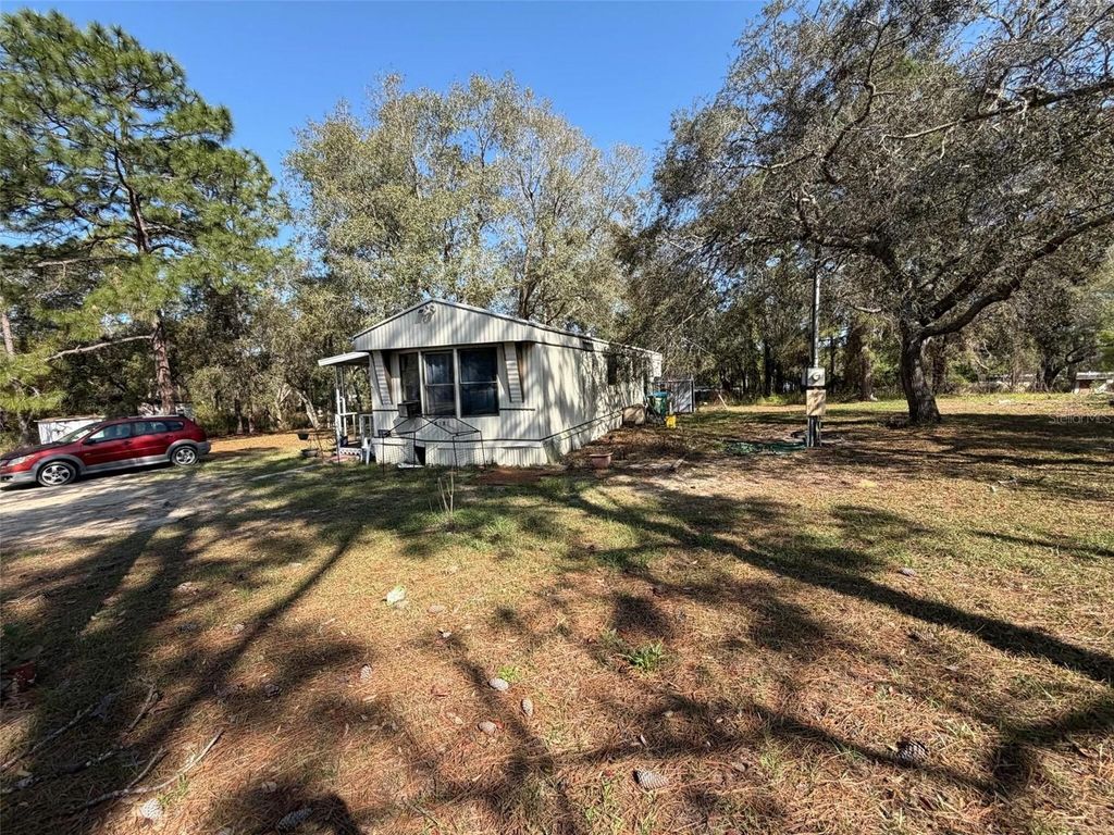 Photo of 5175 W Winter Sun Lane, Homosassa, FL 34446 (MLS # O6391710)