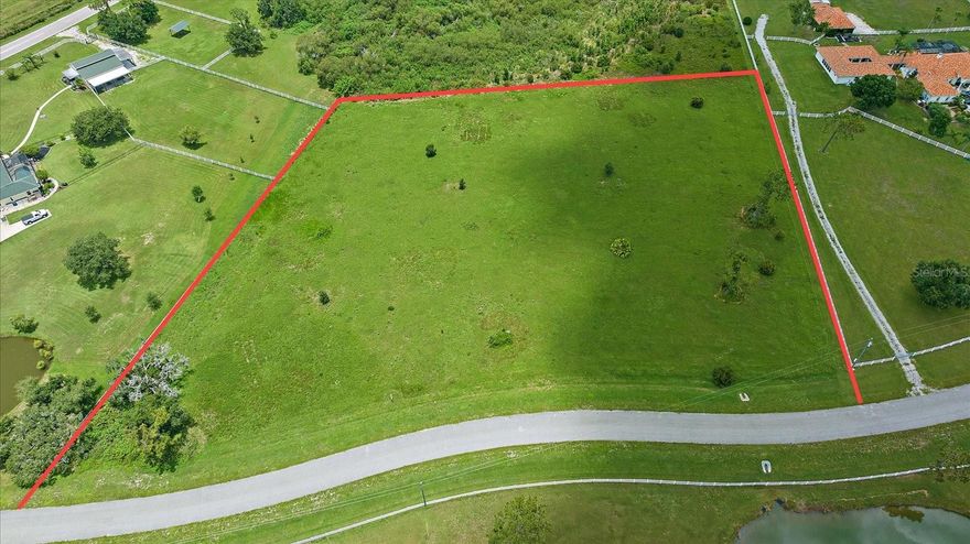 This is it!  Build that new home of your dreams on this amazing 10 Acre Lot!   Have that growing family, extended family or simply want space well here you are!   Located in Sarasota Ranch Club Community.   Horses optional, but some great riding trails nearby! The front of the property is mowed and the back is wooded, left in its natural state, connecting you with nature. It is an easy drive to Sarasota and Bradenton area beaches, Lakewood Ranch, UTC Mall, and I-75, for a quick trip to St. Pete, Tampa and Clearwater. The current owner has been working with a custom builder in the Tampa area to create a unique custom home, and they would be delighted to put you in touch with the builder, to help make your dream come true.