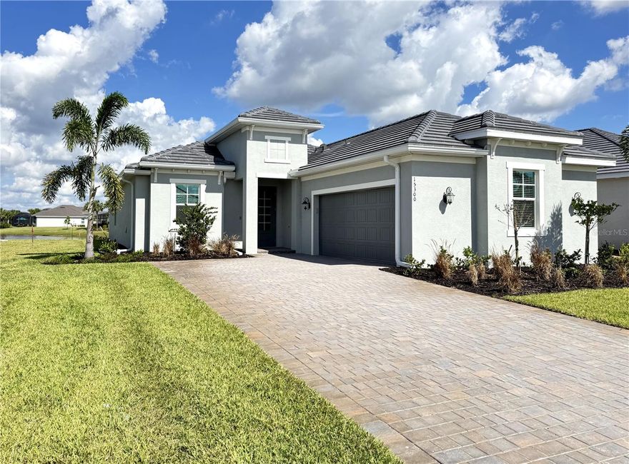 Welcome to 15300 River Birch Ct, Punta Gorda, FL — a stunning Victoria model home that perfectly blends elegance, functionality, and Florida lifestyle flair!Step inside this 2-bedroom + den, 2.5-bath home and fall in love with its open, airy design and thoughtful details throughout. With 1,850 sq. ft. of living space plus a spacious 365 sq. ft. lanai, this home is designed for effortless entertaining and everyday comfort.The gourmet kitchen will delight any chef — featuring stainless steel appliances, granite countertops, WiFi smart oven, soft-close cabinetry, and a tray ceiling for a touch of sophistication. The dining area, just off the kitchen, also boasts a tray ceiling, creating an inviting space for memorable meals.The great room is open and bright, ideal for gatherings or cozy evenings, while the private den with elegant glass double doors is perfect for a home office or hobby space.Retreat to the luxurious primary suite with a walk-in closet, second closet, private lanai access, and a spa-like bath featuring dual sinks, a soaking tub, and a doorless walk-in shower.Guests will appreciate the privacy of the second bedroom and adjacent full bath located at the front of the home. A convenient half bath off the lanai adds an extra layer of ease when entertaining outdoors.Enjoy peaceful mornings or sunset evenings on the 33’ x 10’ screened lanai, overlooking a beautiful lake view, complete with multiple outlets for TVs and accessories — perfect for outdoor living and entertaining.The epoxy-finished 2-car courtyard garage adds curb appeal and function, while the laundry room comes fully equipped with a washer and dryer for your convenience.Located in the Heritage Landing Golf & Country Club, this home offers access to resort-style amenities including a championship golf course, pickleball and tennis courts, fitness center, pool, spa, clubhouse dining, and more!Heritage landing is a gated, amenity-rich community with a championship Gordon Lewis golf course, 3 on-site restaurants, tennis & pickleball, a state-of-the-art fitness center with sauna, resort-style pool, vibrant social calendar. Minutes to Punta Gorda's waterfront & historic district, marinas, parks dining, and I-75. Welcome home! Note: Lot size is estimated.