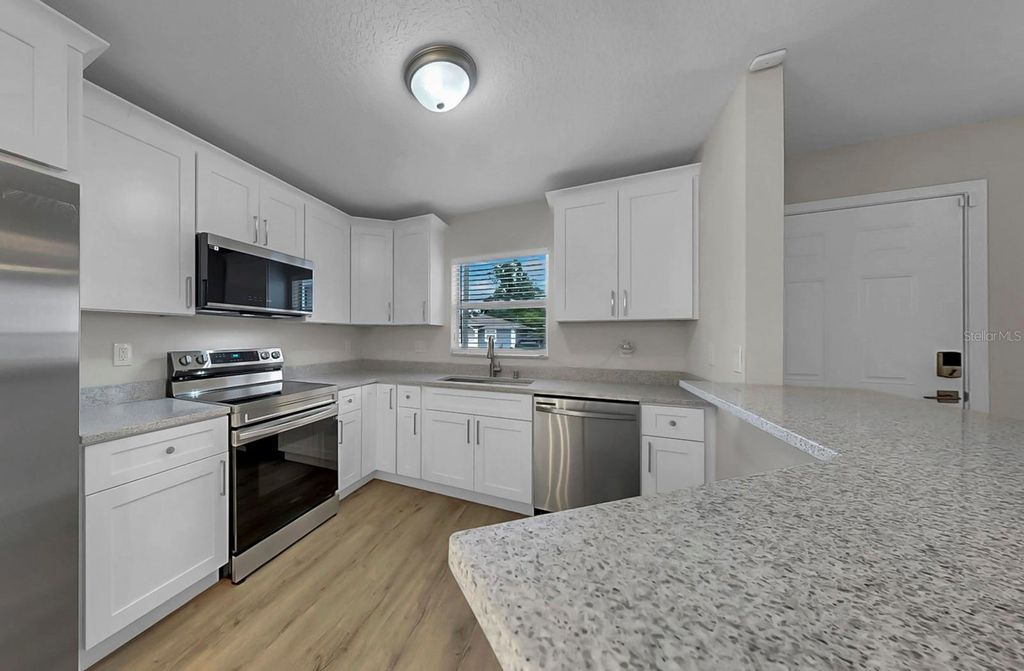 Photo of 3609 E 38th Avenue, Tampa, FL 33610 (MLS # TB8436920)