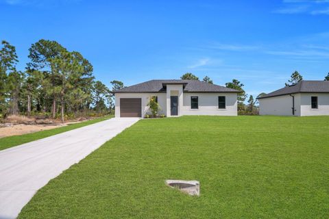 Photo of 635 Summit Avenue S, Lehigh Acres, FL 33974 (MLS # A4684906)