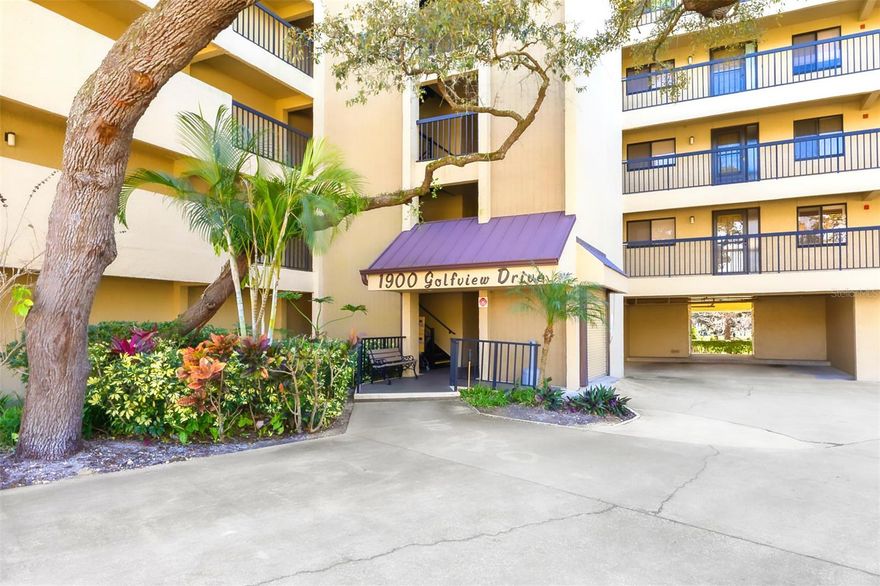 One or more photo(s) has been virtually staged. One or more photo(s) has been virtually staged. Motivated Seller and New Lower Price!  Rare 3rd Floor Corner Unit with Golf Course Views! Located in the highly desirable 55+ Green Dolphin community with wide golf course views and abundant natural light. If you’ve been waiting for a condo you can update to your own taste — without paying for someone else’s remodel — this is it. This 2-bedroom, 2-bath layout offers a bright, open living and dining space that flows to a screened lanai overlooking the fairways, accessible from both the living room and primary suite. The split-bedroom floor plan provides privacy for guests, and the spacious primary suite includes lanai access, a walk-in closet, and ensuite bath. Full-size washer and dryer included. Green Dolphin residents enjoy a clubhouse, fitness center, pool, tennis and pickleball courts, shuffleboard, and more. HOA includes cable, high-speed internet, water, trash, exterior maintenance, elevators, and amenities. Under-building parking with storage plus plenty of guest parking. Located just minutes from the Tarpon Springs Sponge Docks, downtown restaurants, golf, Pinellas Trail, and area beaches.