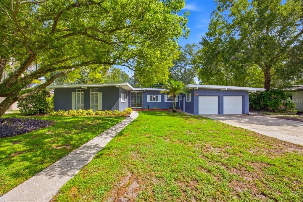 Photo of 1626 Sims Place, Lakeland, FL 33803 (MLS # TB8537229)