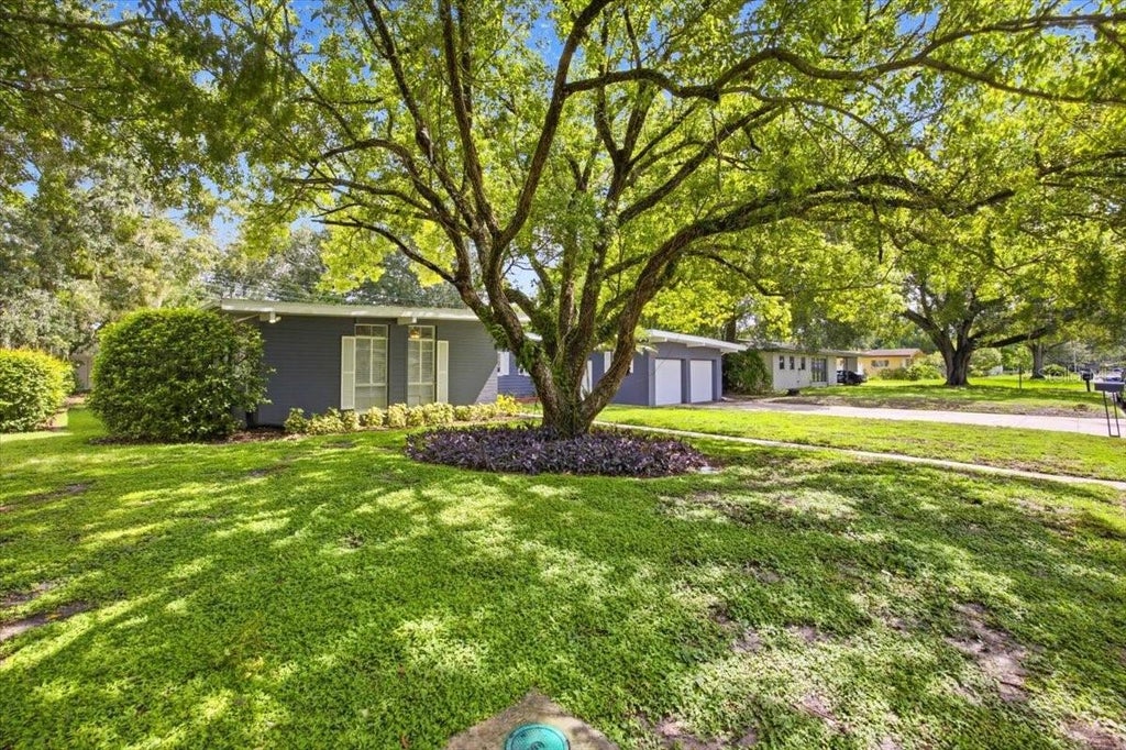 Photo of 1626 Sims Place, Lakeland, FL 33803 (MLS # TB8537229)