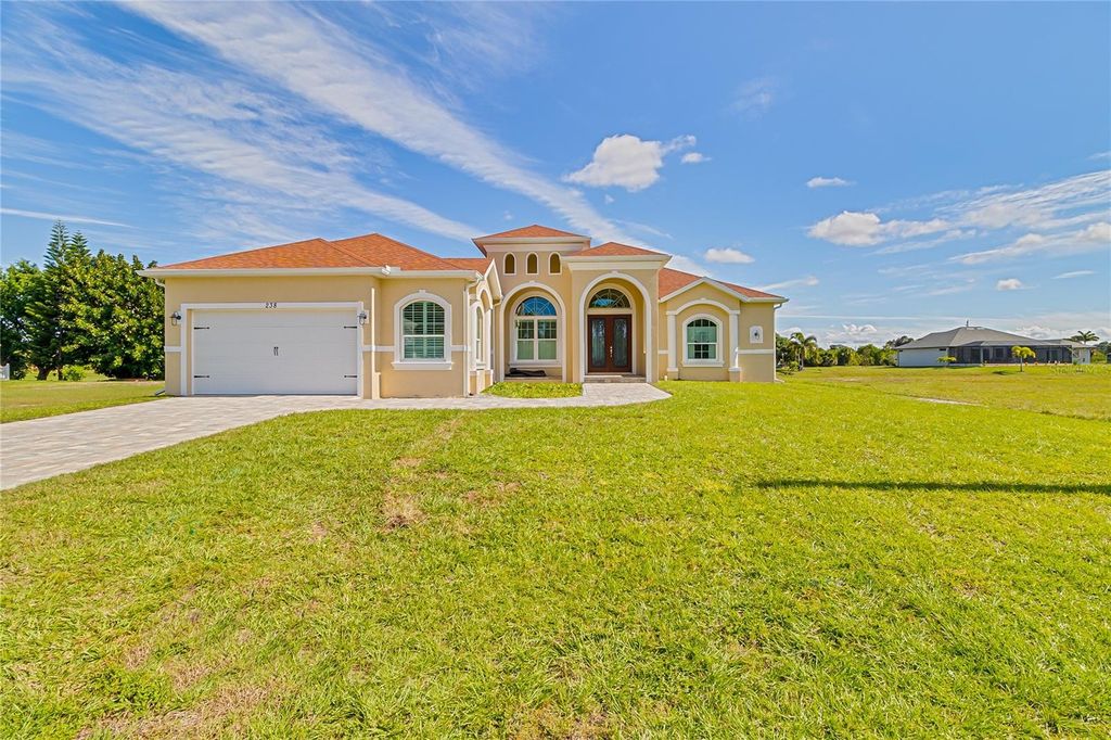 Photo of 238 W Pine Valley Lane, Rotonda West, FL 33947 (MLS # C7520672)