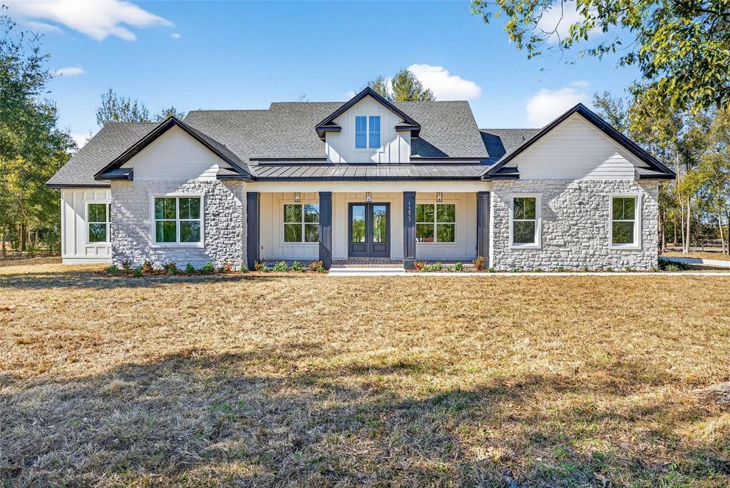 Photo of 14823 Crimson Oaks Trail, Dade City, FL 33525 (MLS # TB8476023)