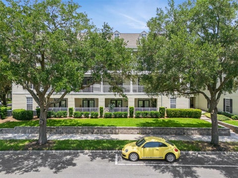 Photo of 315 Grand Magnolia Avenue #203, Celebration, FL 34747 (MLS # O6421114)
