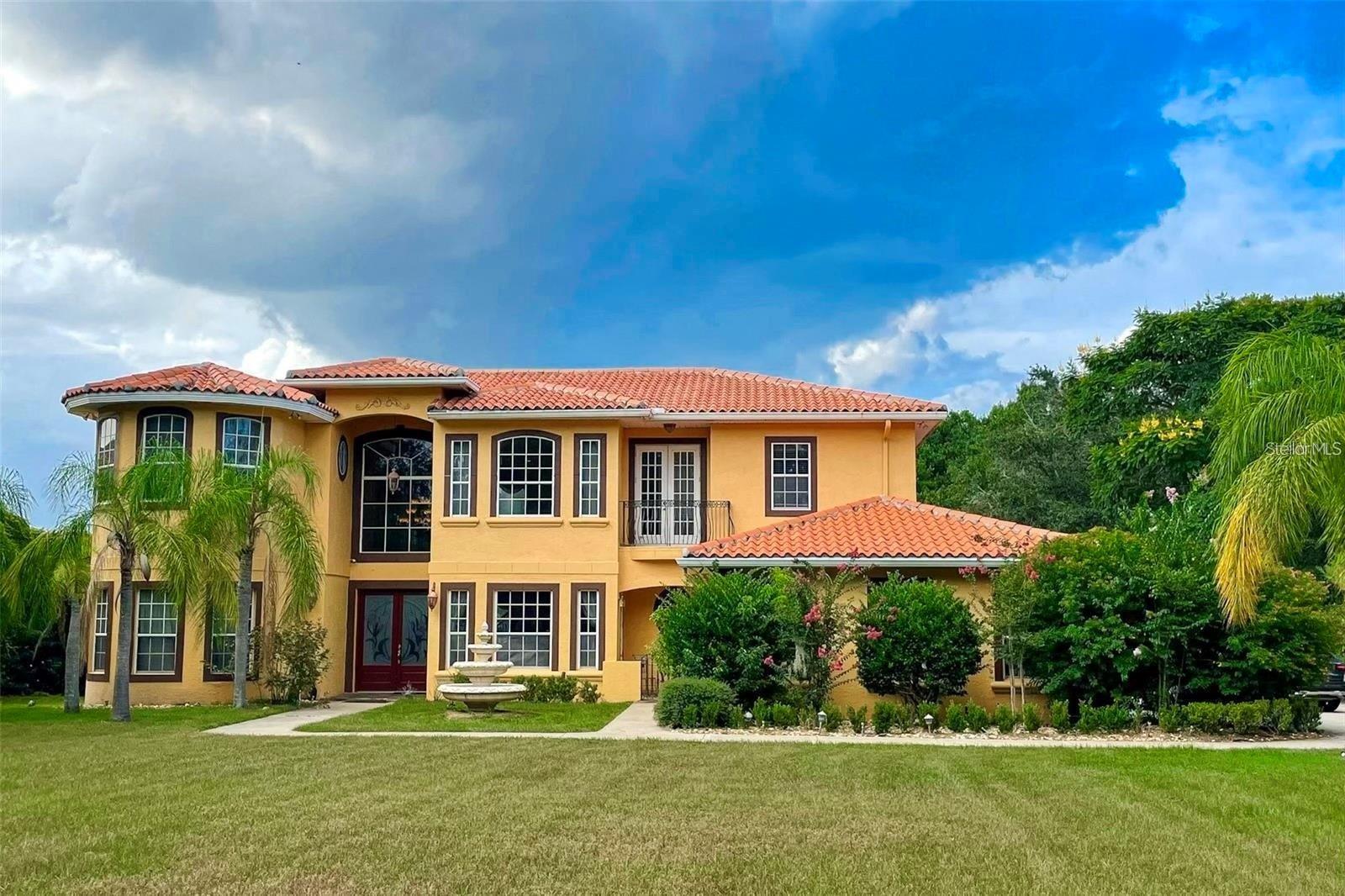 Extraordinary lake front opportunity in Windermere on 1.75 acres! PRIVATE GATES! NO HOA! SPECTACULAR LAKE VIEWS, PRIVACY, SPORTS COURT, AND GAZEBO ON LAKE ROPER - A WATER SKI FRIENDLY LAKE! A grand entryway leads you to magnificent two story ceilings and welcomes you into a separate living and family room. Beautiful 5-bedroom, 3/2-bathroom Mediterranean-style home with inlaid marble medallion foyer floor design, coffered ceilings, crown molding, and European-style ironwork boasts spectacular views of Lake Roper. The upstairs master bedroom has a beautiful view of Lake Roper. Master bath features an oversized tub and walk-in closet. This Grand Retreat has plenty of outdoor amenities including a basketball court, boat dock and boat lift. Heated family pool and spa. For all your family entertainment, a large open backyard leads to the dock with plenty of land. Stunning cedar and cypress trees surrender the property reminding you of FLORIDA living at its best. The ideal setting for privacy and serenity! Entertainment and fine shopping just minutes away. Close to major highways such as 429, 408 & the Turnpike. Easy access to the airport and Downtown Orlando yet secluded enough to give you a unique home in the heart of Windermere! Close to Windermere Prep school. Convenient to major highways, shops, restaurants, historic sites, major hospitals, and theme parks! Privacy awaits you! Schedule showing!